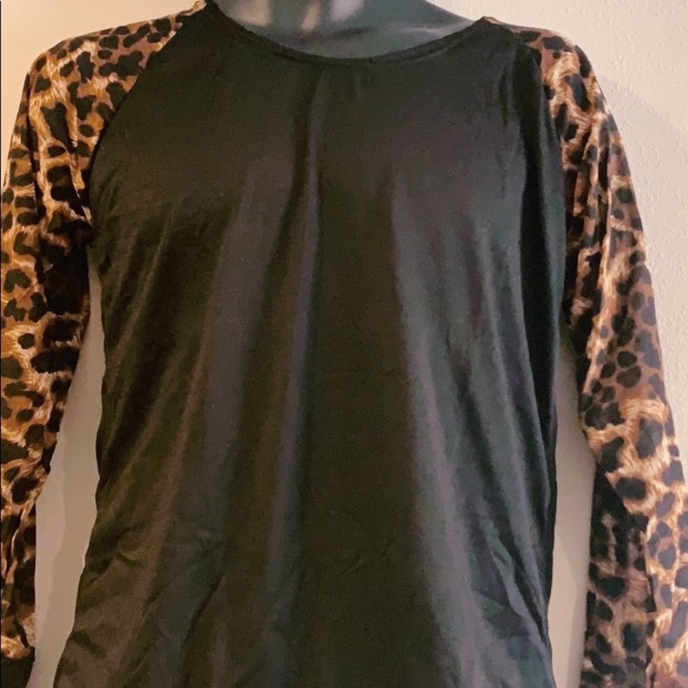 Long sleeve cheetah print shirt.